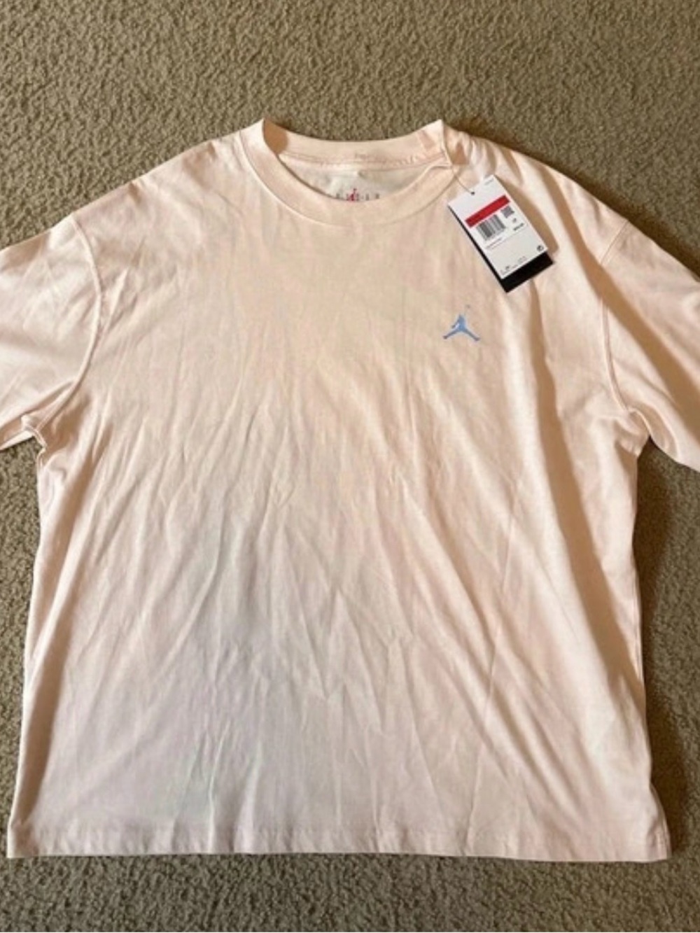 Nike Women’s Short Sleeve Crew Tee in Light Pink with Jumpman Logo